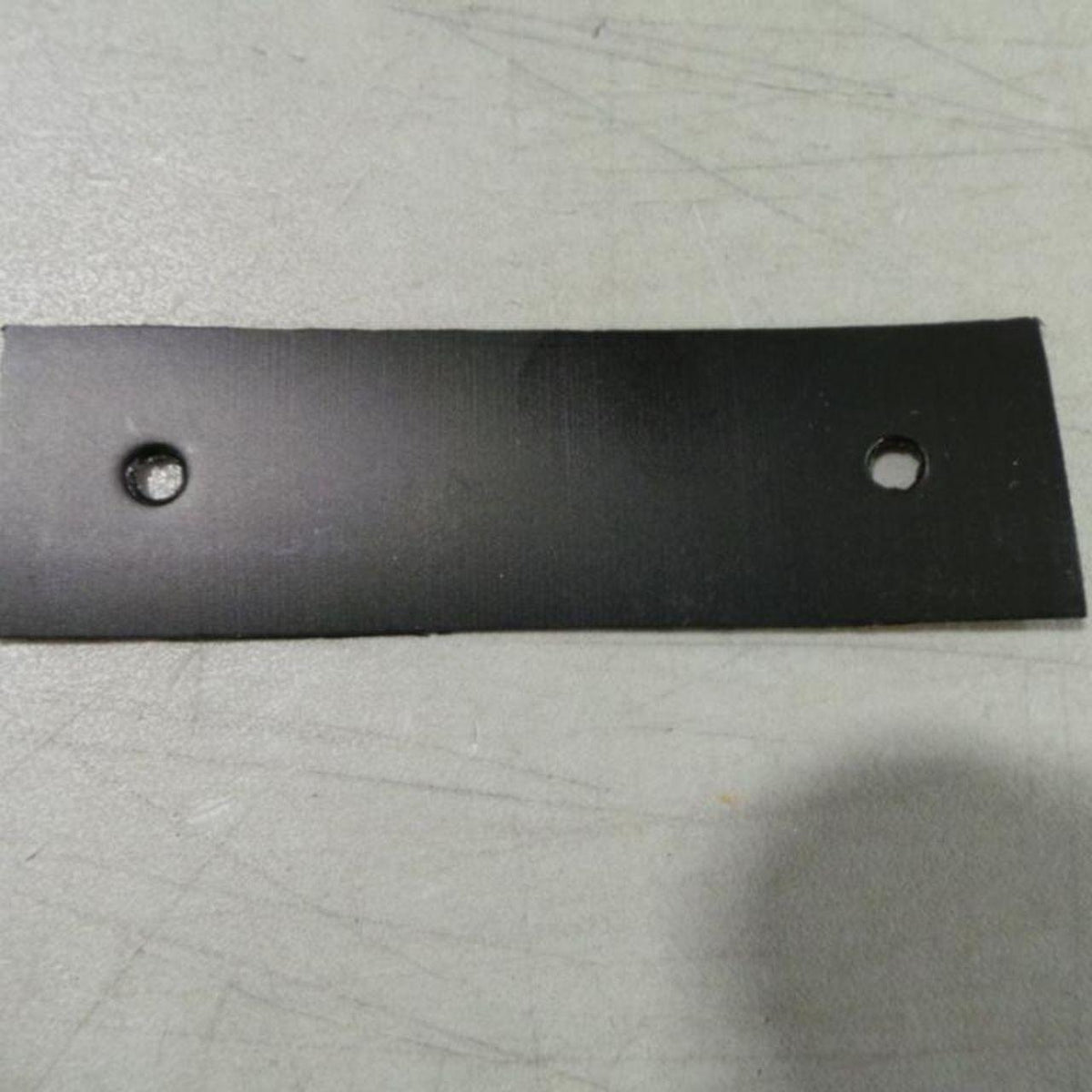 R54047 - OEM PAD SHIM LATCH BRACKET - CASE CONSTRUCTION